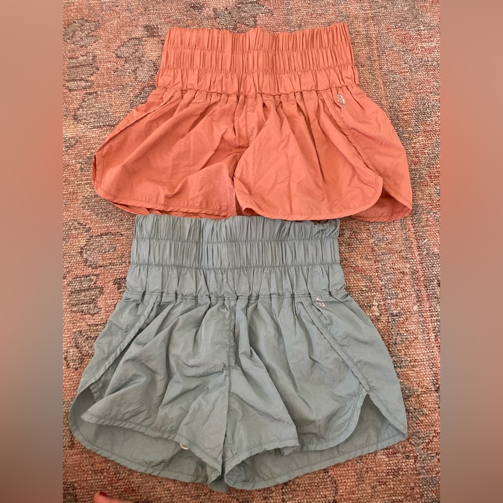 Two never worn Free People ‘The Way Home’ running shorts.
